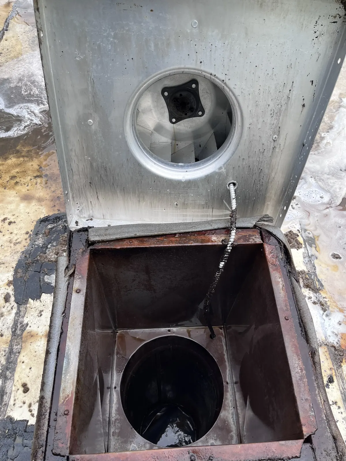 Upblast fan curb & housing after cleaning